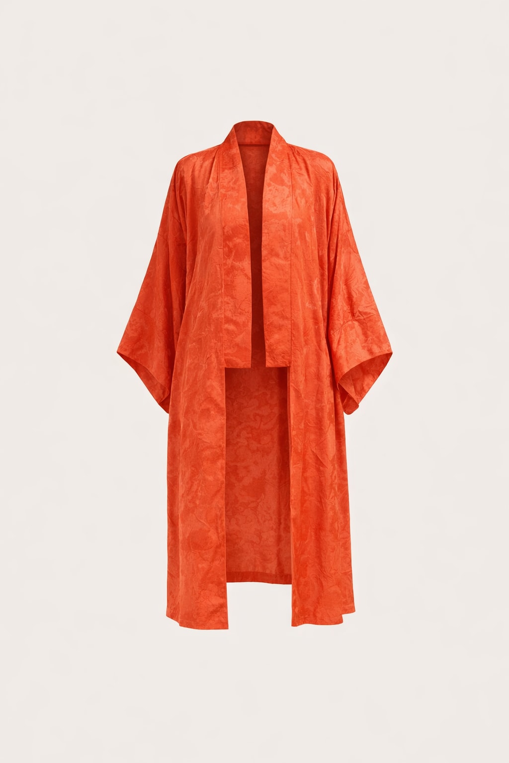 Coral orange jacquard kimono cardigan with an open front, wide draped sleeves and a tonal floral weave, falling below the knee
