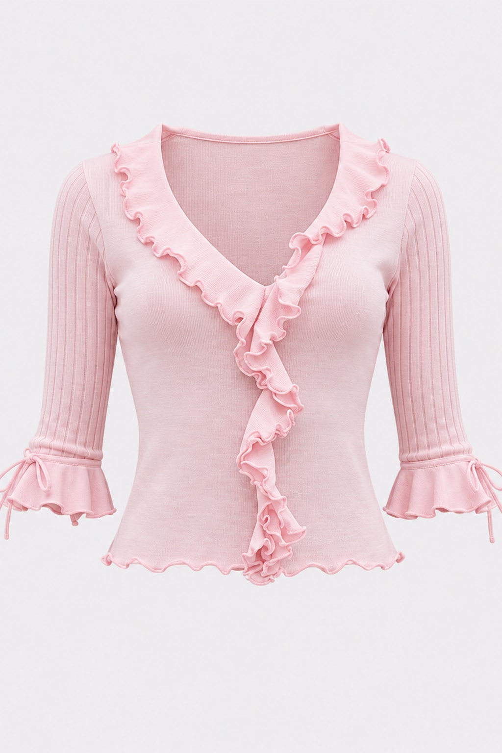 Ribbed knit pullover top with a ruffle trim down the front V neckline and three-quarter flared sleeves with tie cuffs