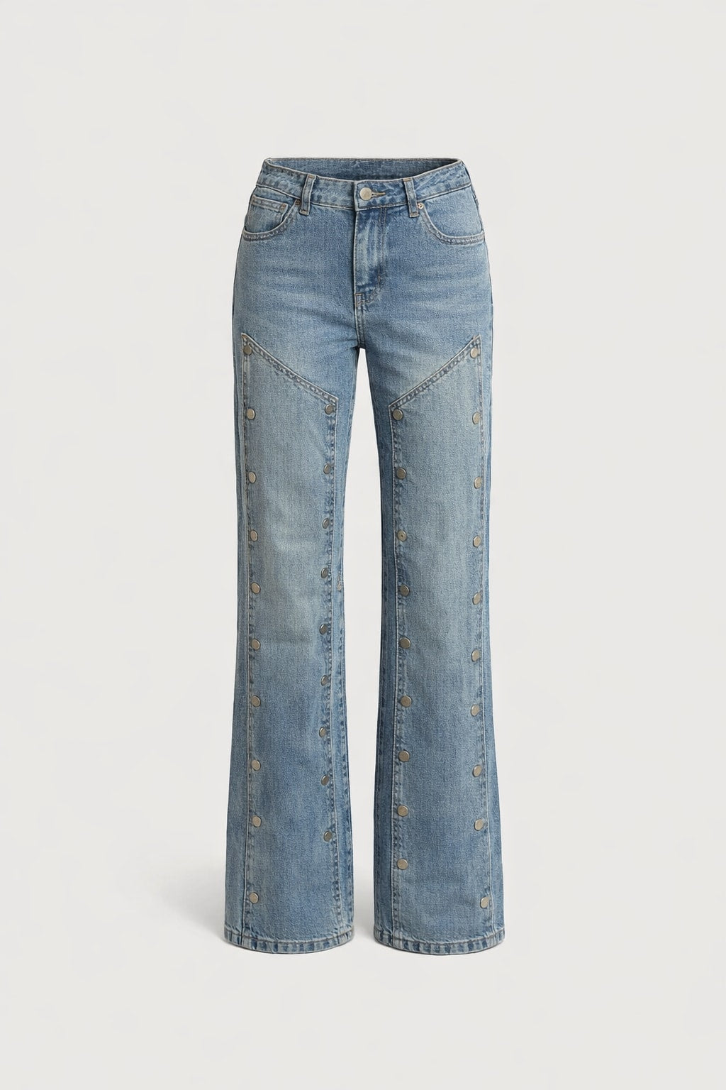 Light wash high-waist denim wide-leg jeans with rows of metal buttons running down both outer leg seams and Western yoke panels