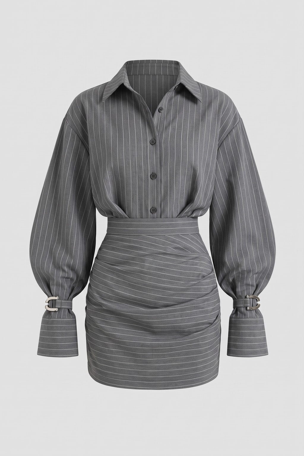 Pinstripe two-piece set laid flat: oversized button-front shirt with buckled cuffs and ruched high-waist mini skirt