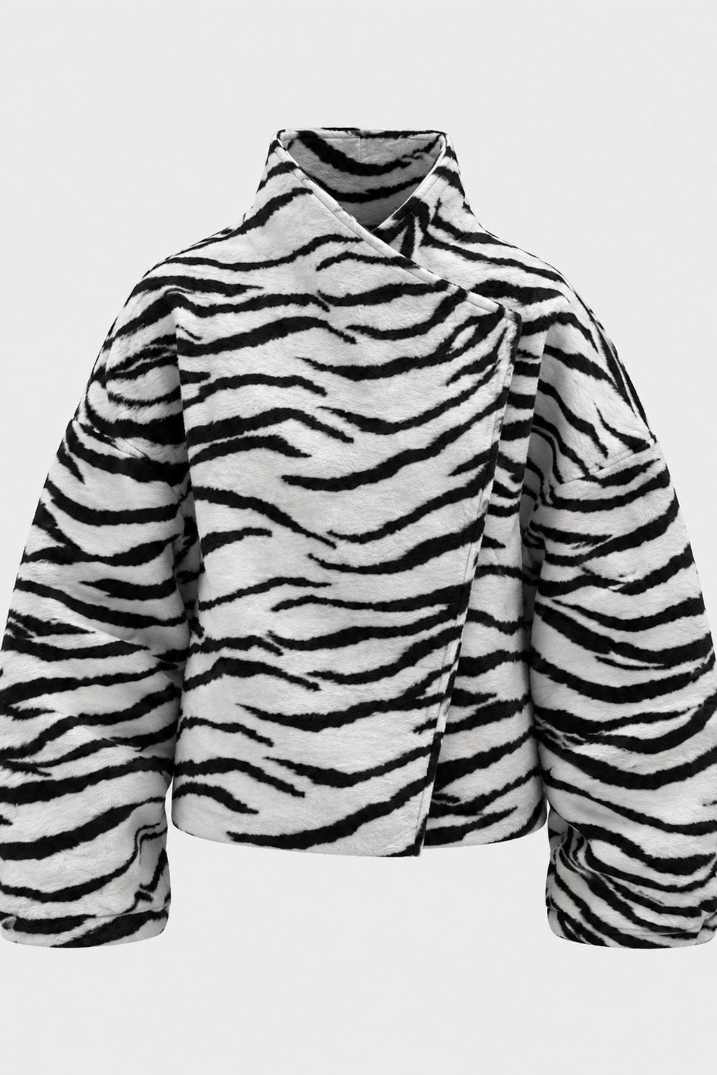 Black and white zebra print faux fur cropped jacket with an asymmetric wrap front and tall funnel collar