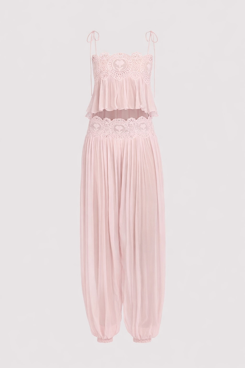 Pale pink chiffon two-piece set with a lace babydoll top on tie shoulder straps and matching full-length harem pants gathered into a scalloped lace waistband