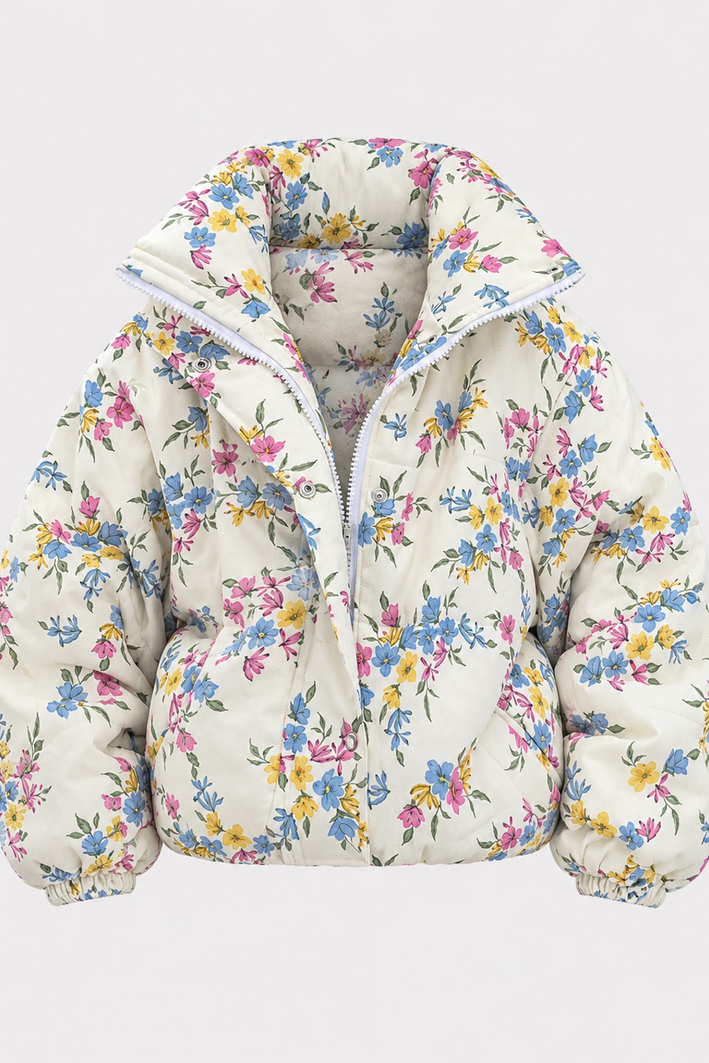 Cream oversized puffer jacket in a ditsy floral print with a tall stand collar and full zip