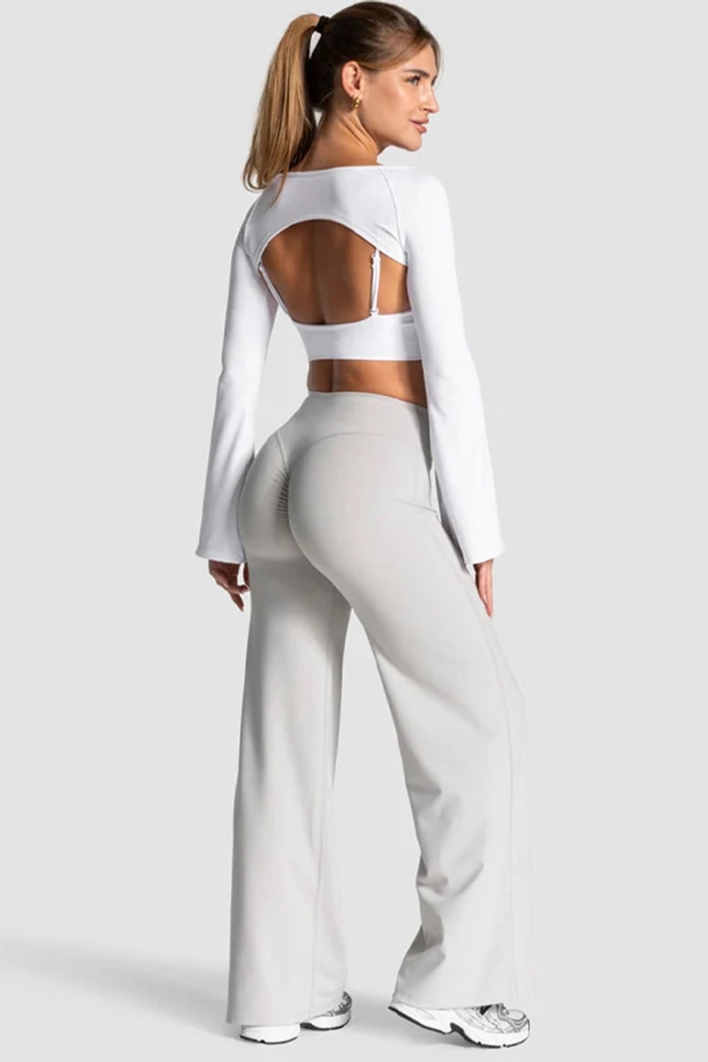 High waist flare yoga pants in light grey with a V back waistband and a centre scrunch seam