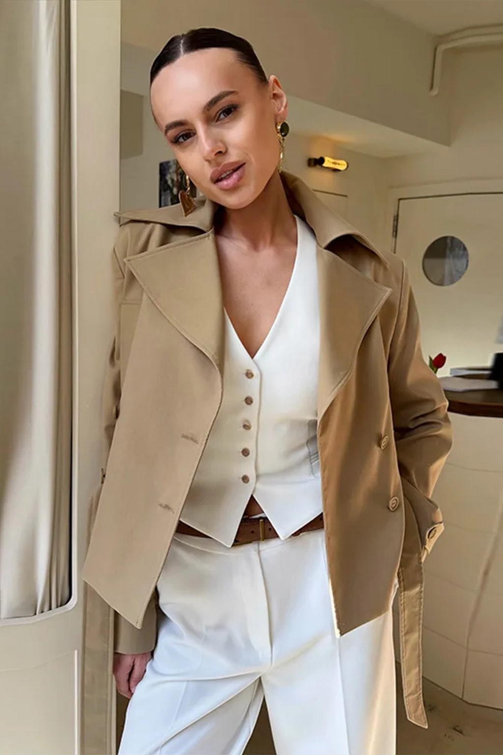 Khaki two-piece set with a cropped double-breasted trench jacket with a tie belt and a pencil maxi skirt