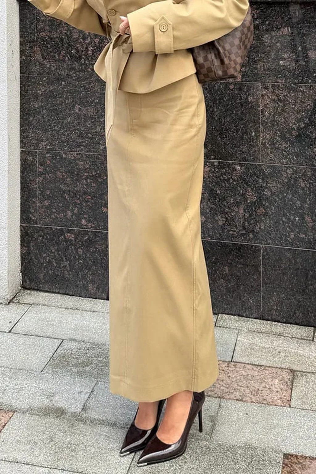 Khaki two-piece set with a cropped double-breasted trench jacket with a tie belt and a pencil maxi skirt