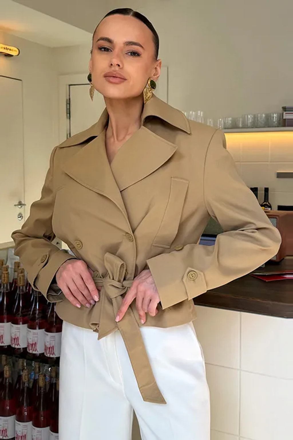 Khaki two-piece set with a cropped double-breasted trench jacket with a tie belt and a pencil maxi skirt