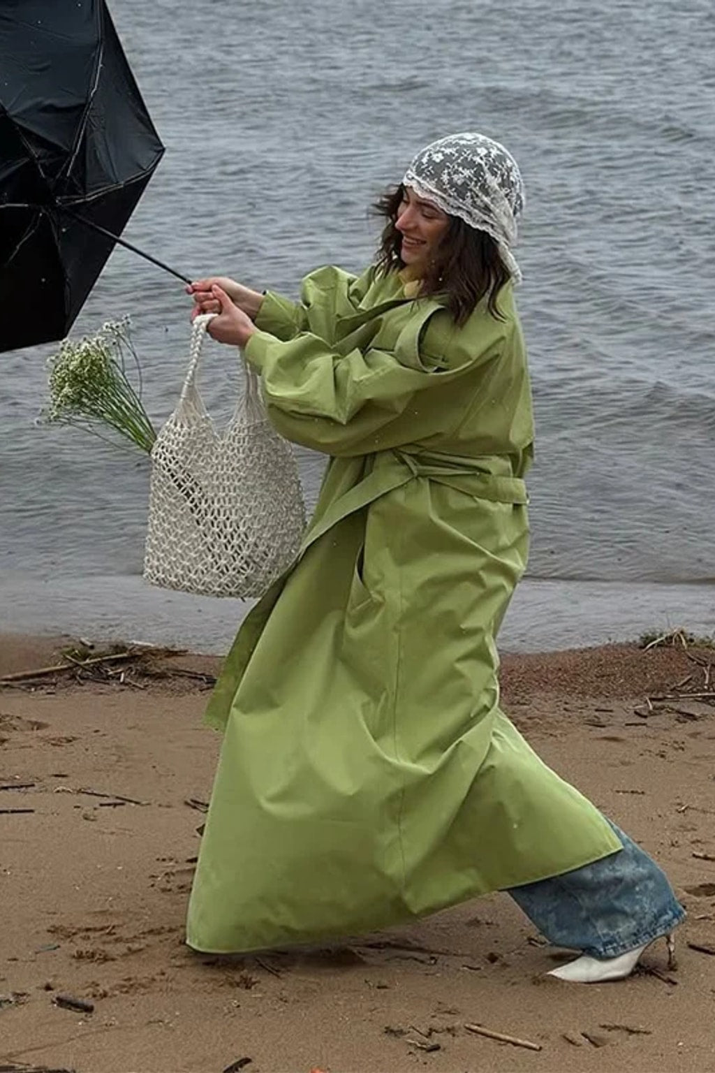 Lime green oversized maxi trench coat with a wide self-tie belt, storm flap and buckled cuff tabs