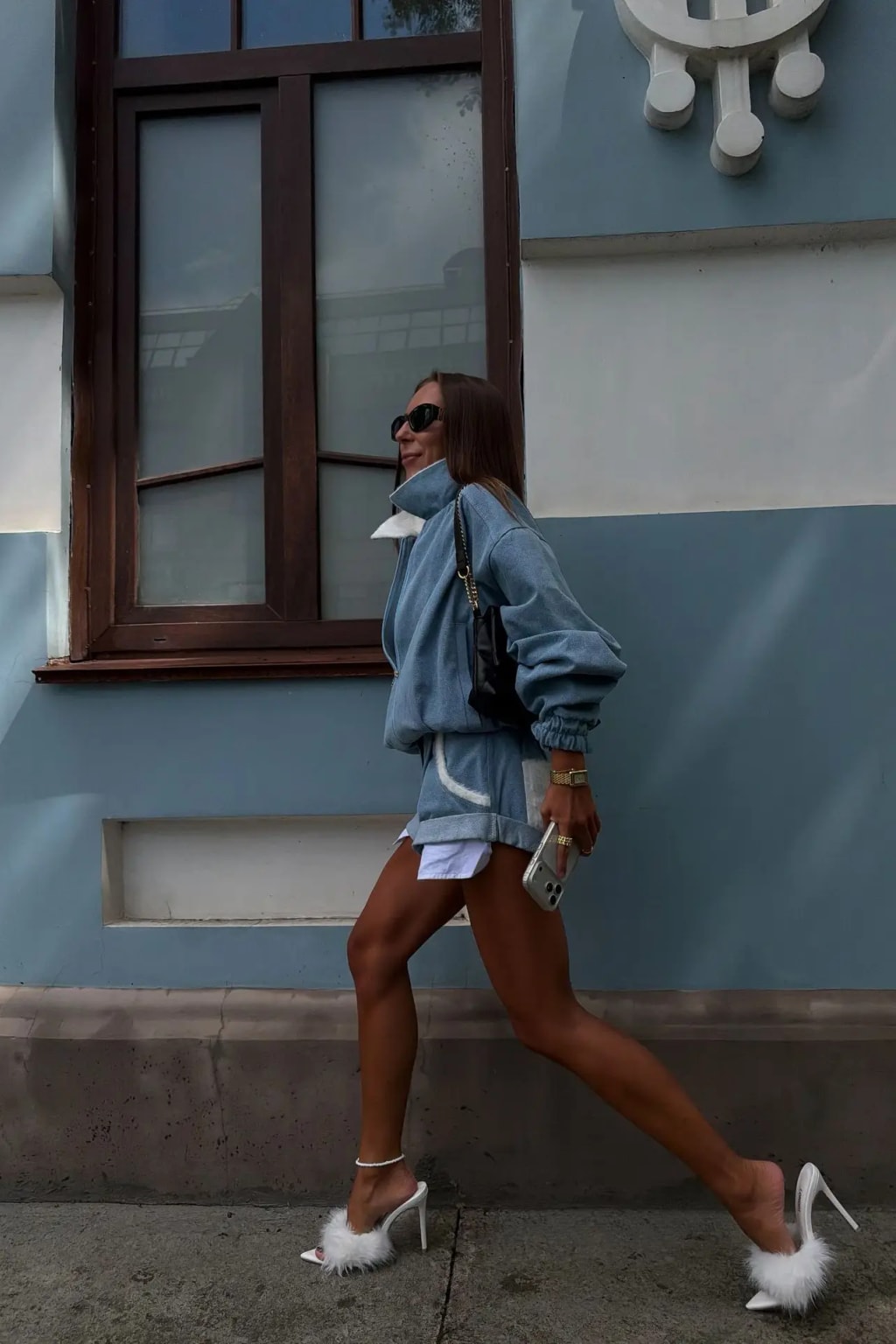 Light blue corduroy set with a cropped zip jacket and high waist shorts trimmed in white faux fur
