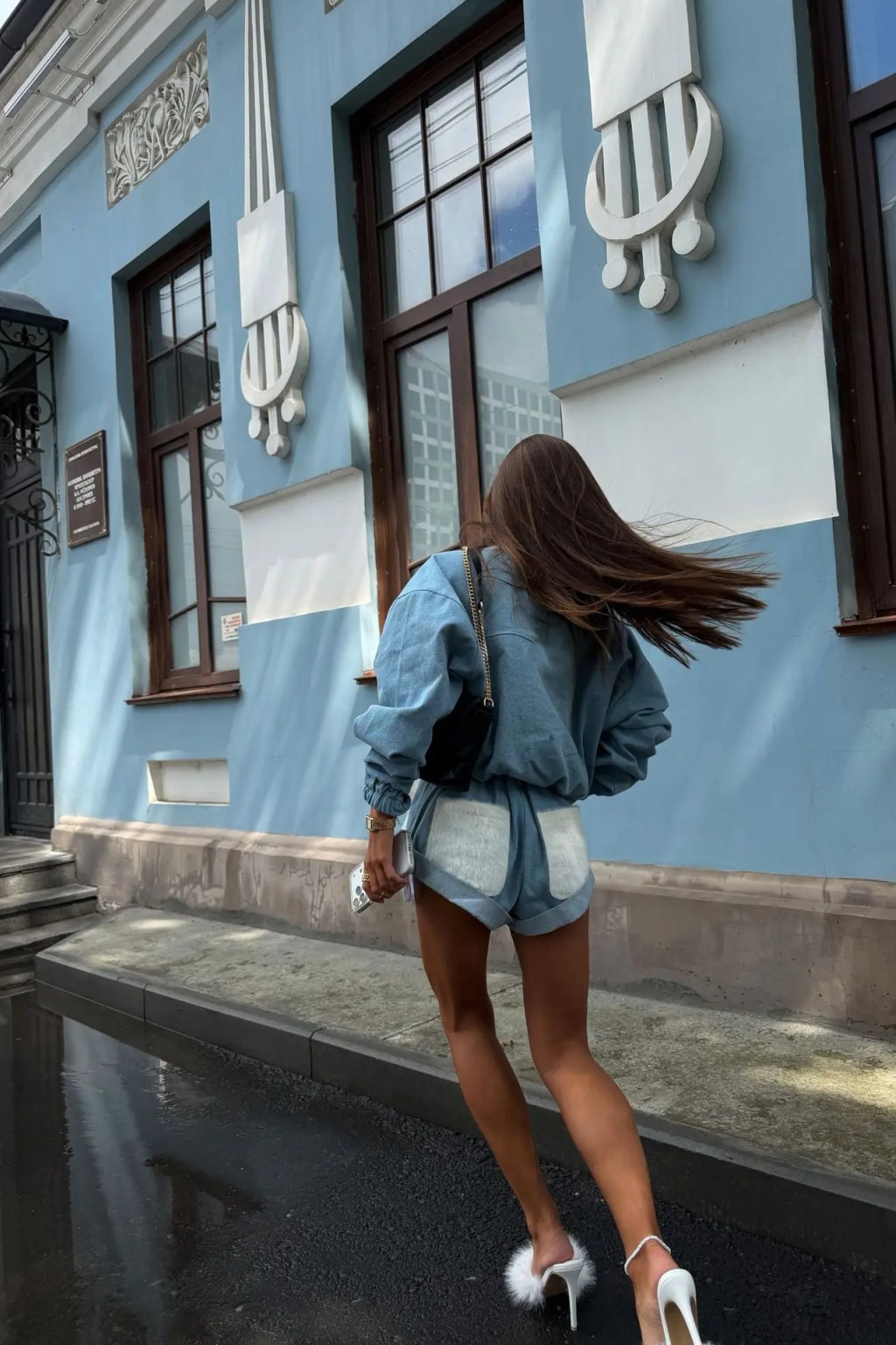 Light blue corduroy set with a cropped zip jacket and high waist shorts trimmed in white faux fur