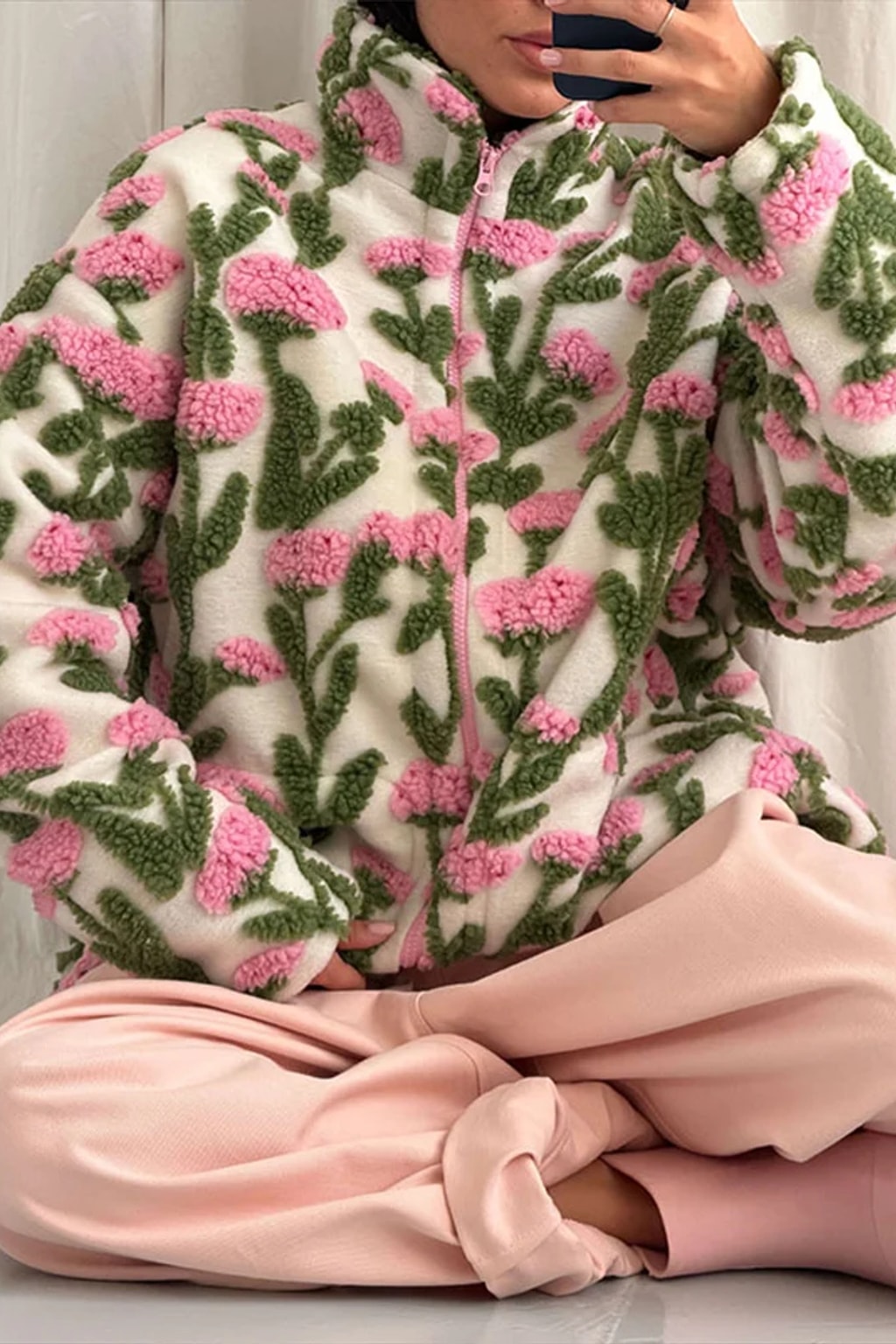 Oversized cream sherpa fleece jacket with raised pink and green floral tufting and a stand collar