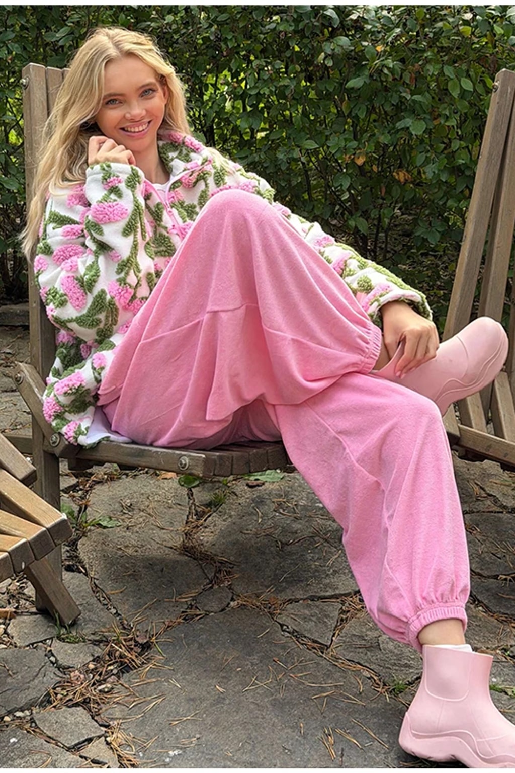 Oversized cream sherpa fleece jacket with raised pink and green floral tufting and a stand collar