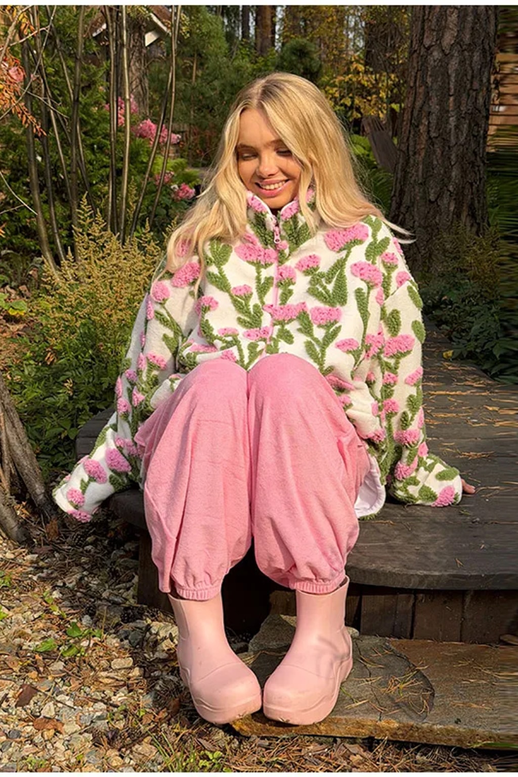 Oversized cream sherpa fleece jacket with raised pink and green floral tufting and a stand collar