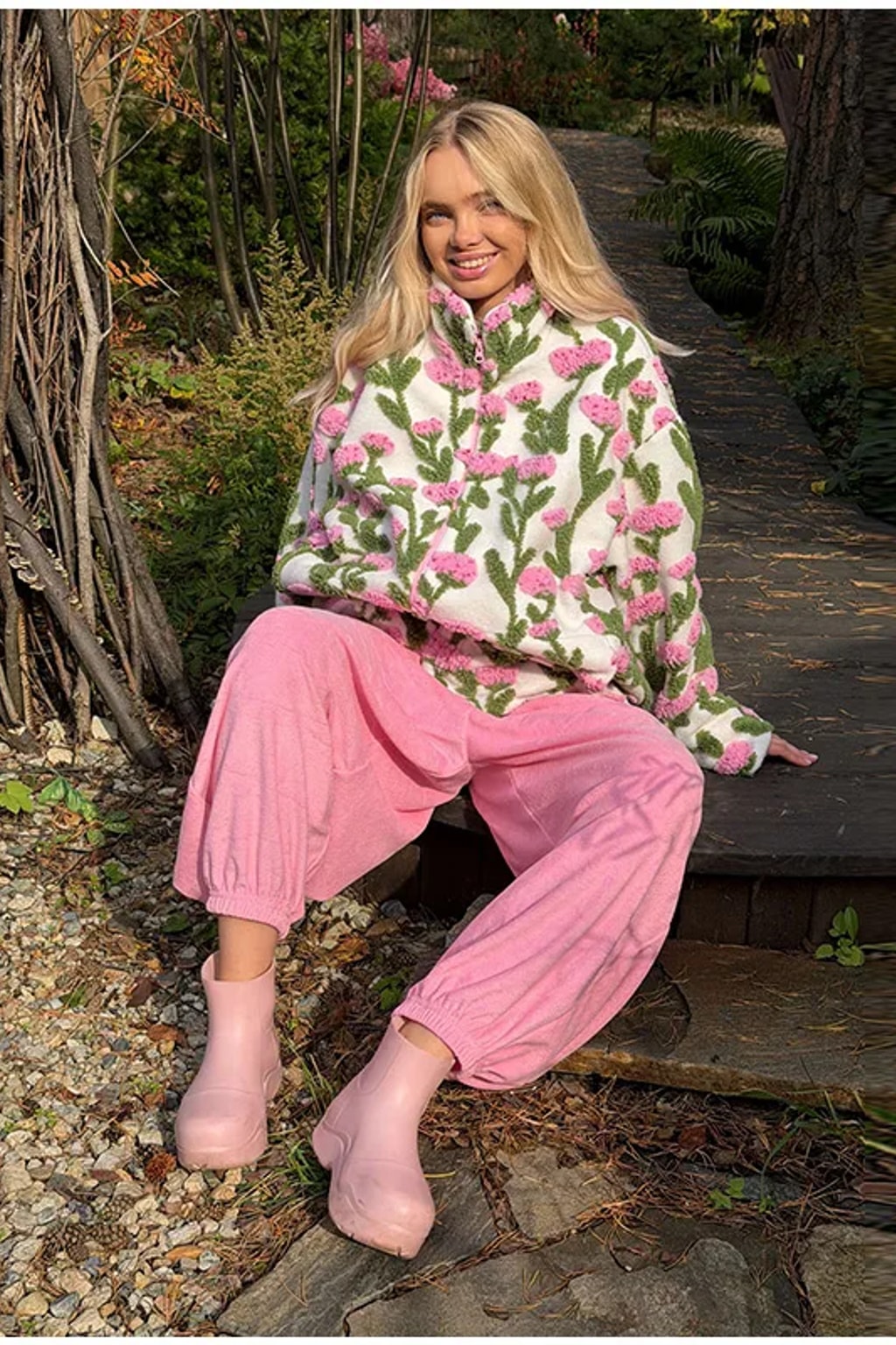 Oversized cream sherpa fleece jacket with raised pink and green floral tufting and a stand collar