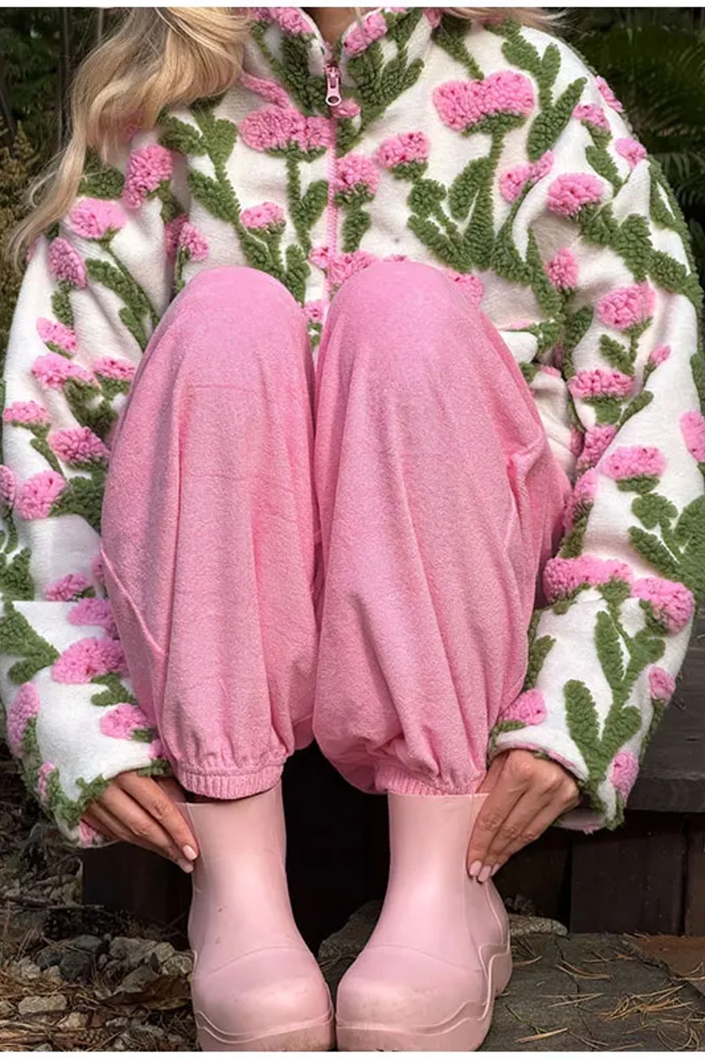 Oversized cream sherpa fleece jacket with raised pink and green floral tufting and a stand collar