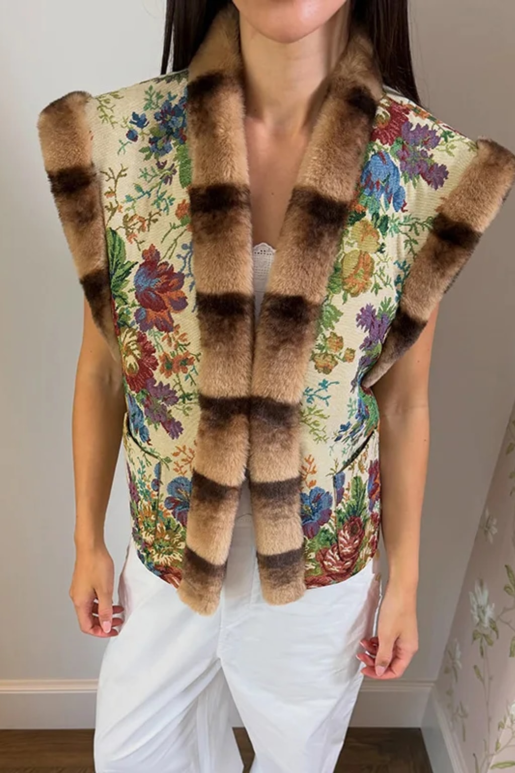 Cream floral tapestry waistcoat edged in brown faux fur at the collar, front and armholes