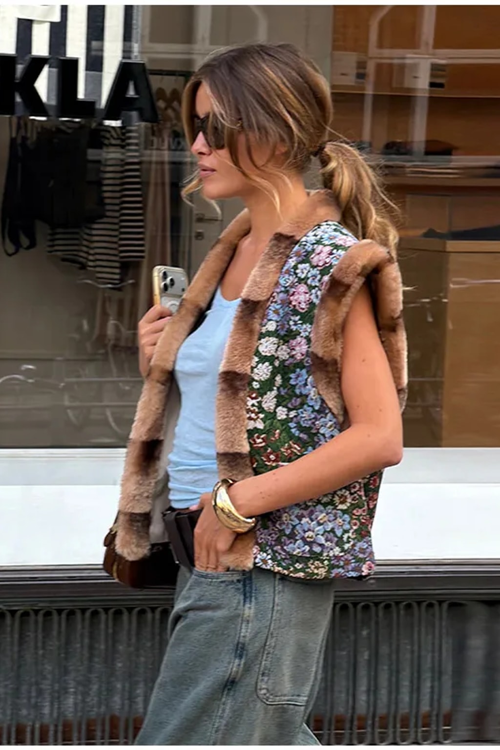 Floral tapestry sleeveless waistcoat edged in brown faux fur at the collar, front and armholes