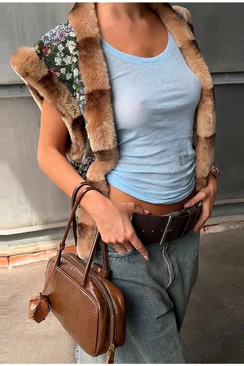 Floral tapestry sleeveless waistcoat edged in brown faux fur at the collar, front and armholes