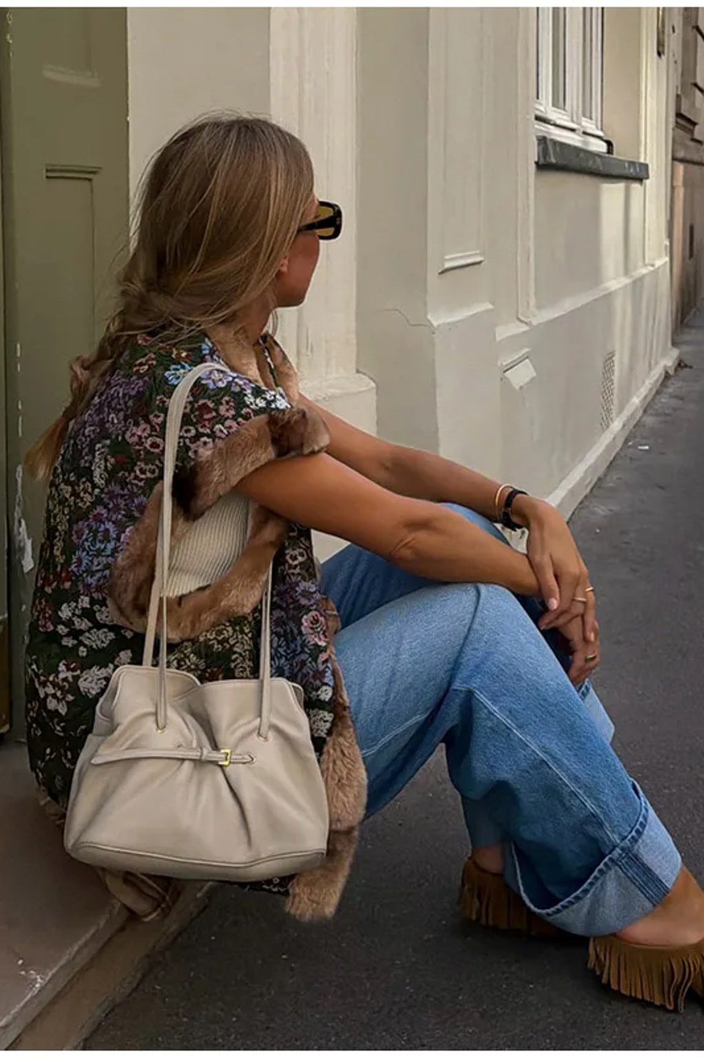 Floral tapestry sleeveless waistcoat edged in brown faux fur at the collar, front and armholes