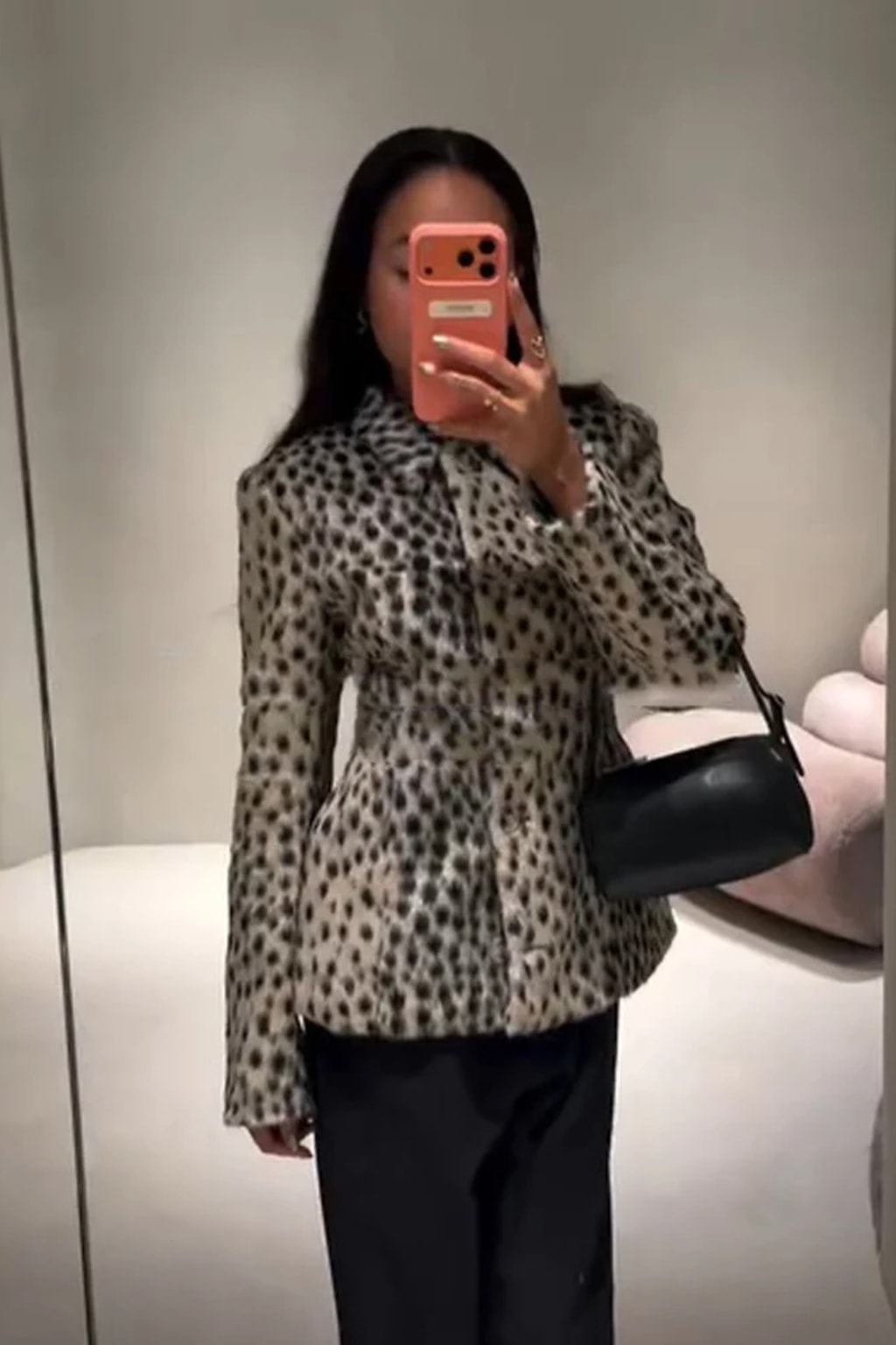 Animal print faux fur jacket with a stand collar, button front and deep contrast dark brown fur cuffs