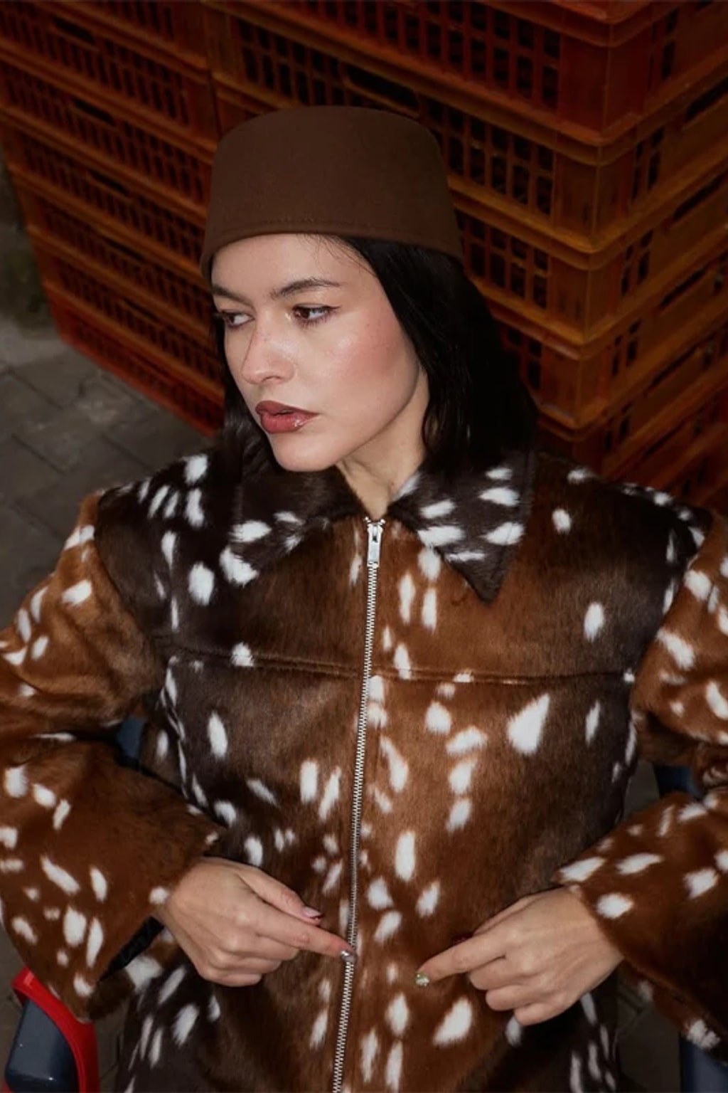 Animal print faux fur jacket with a stand collar, button front and deep contrast dark brown fur cuffs