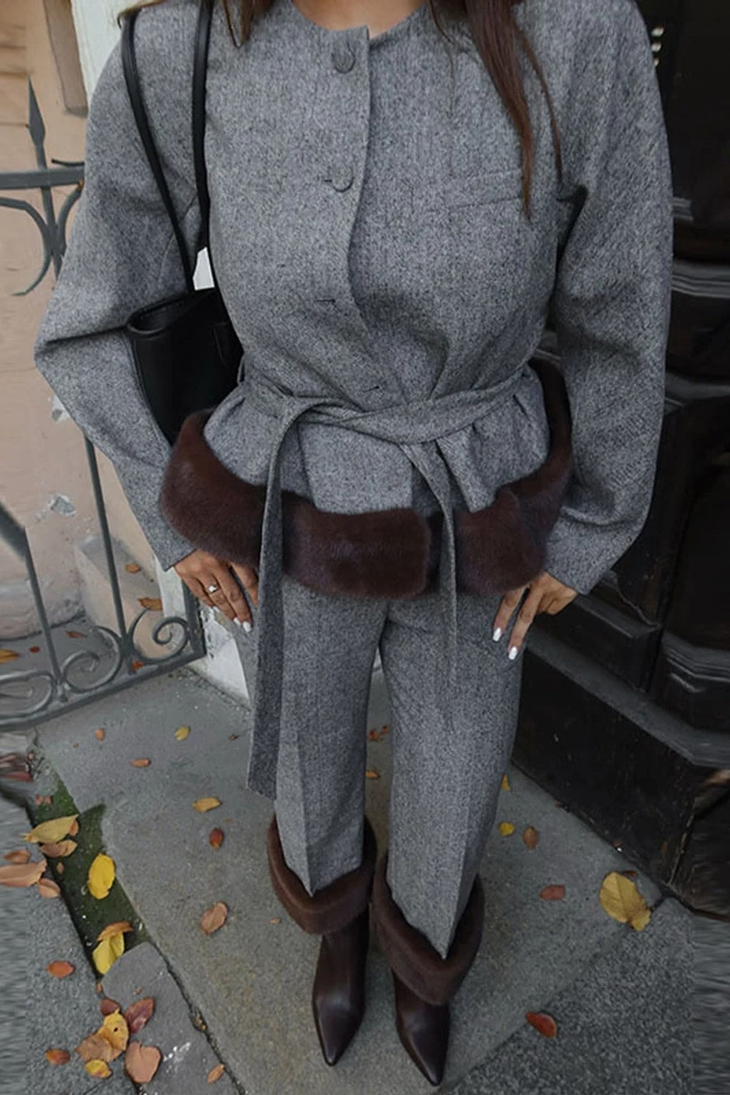 Grey belted jacket with a wide brown faux fur hem band and matching straight leg trousers
