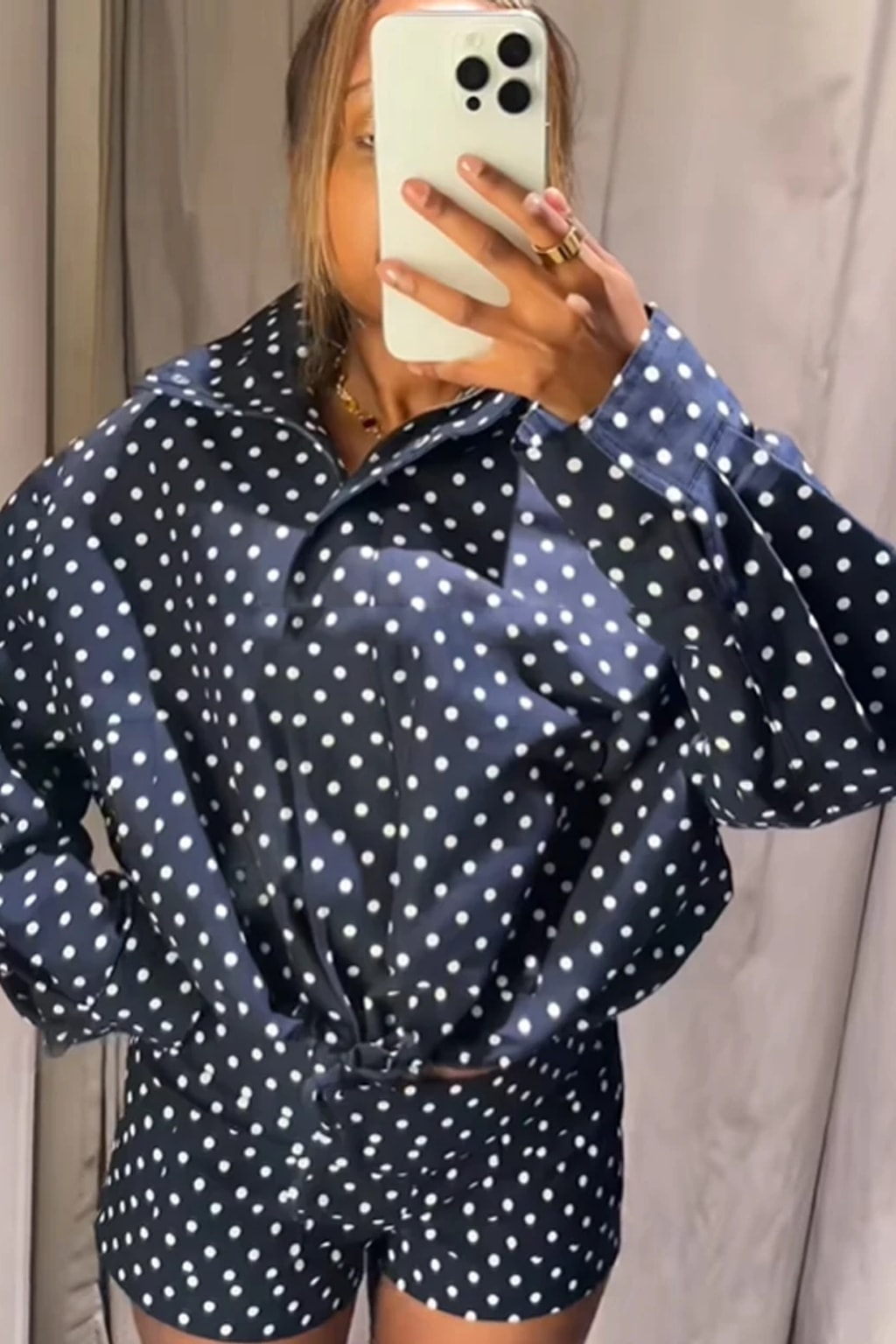 Polka dot two piece set of a long sleeve jacket and matching shorts
