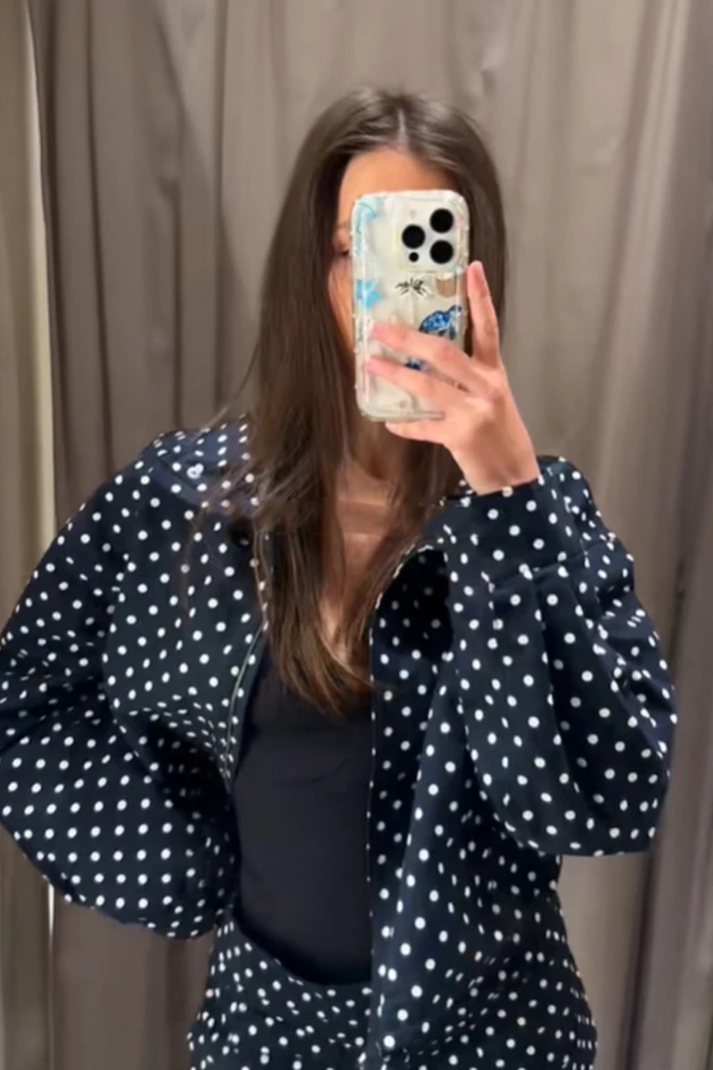 Polka dot two piece set of a long sleeve jacket and matching shorts