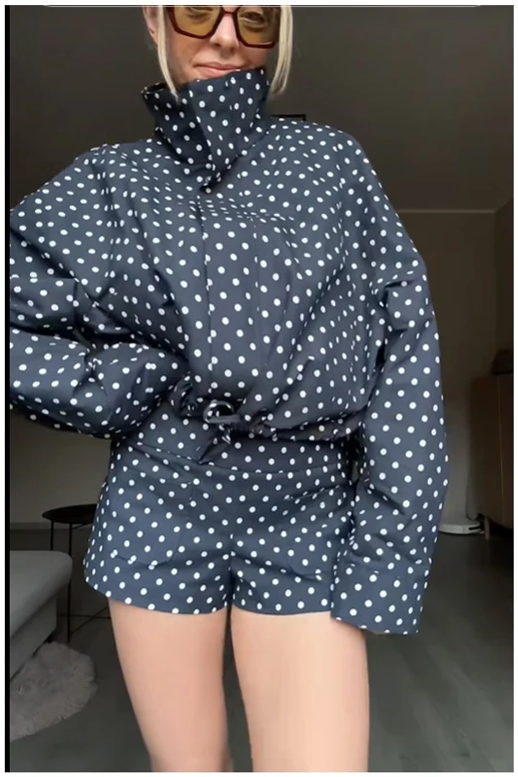 Polka dot two piece set of a long sleeve jacket and matching shorts