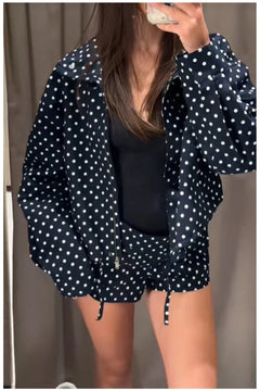 Navy polka dot oversized hooded zip jacket with drawstring hem and matching drawstring shorts