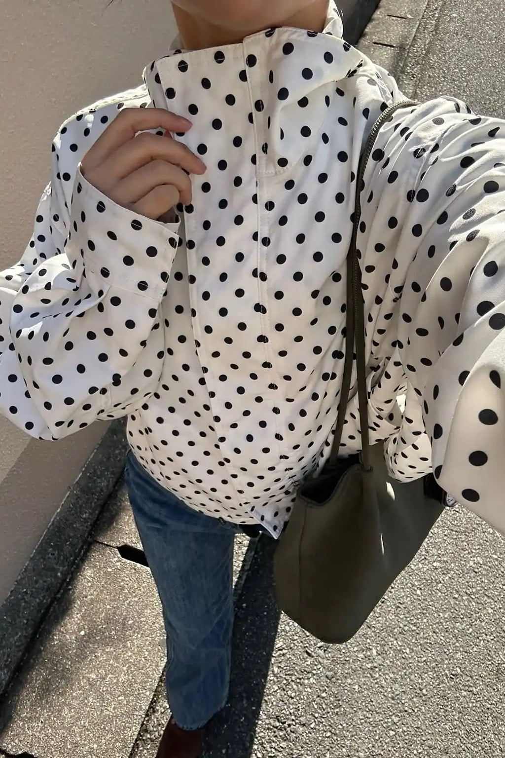 Polka dot two piece set of a long sleeve jacket and matching shorts
